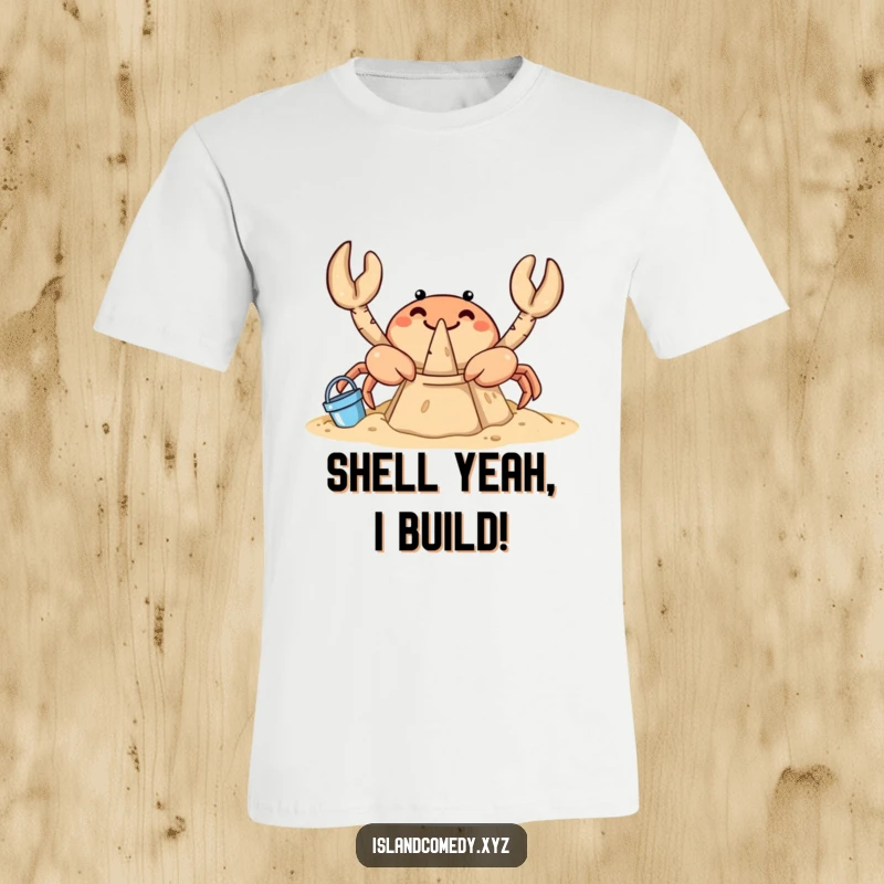 Funny crab t-shirt depicting a curious crab joyfully constructing a sandcastle with tiny tools on a sandy shore.